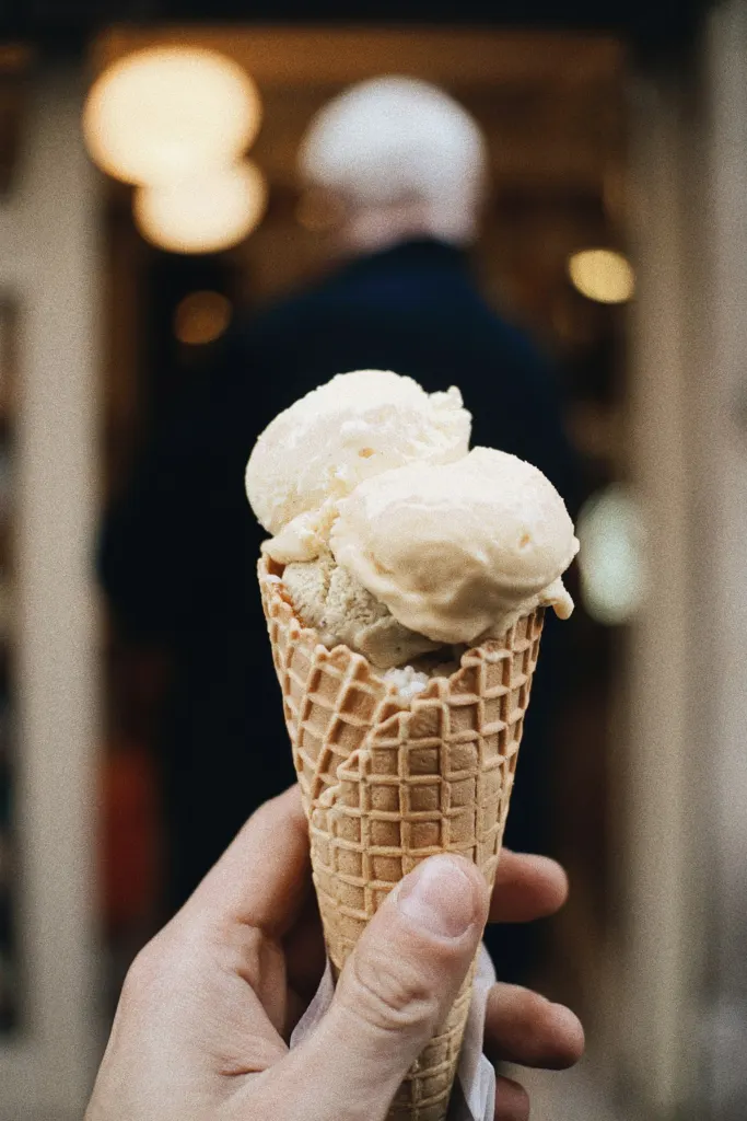 Two scoops of gelato in a waffle cone