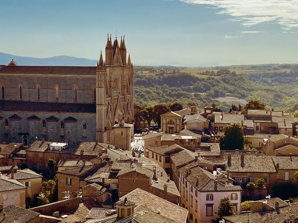 Orvieto rooftops and the cathedral above the Umbrian countryside